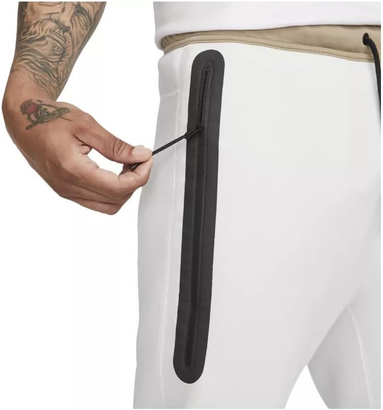 Nike m nk tch flc jggr Herrenhosen – Bild 5